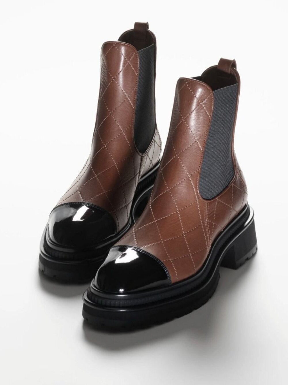 CHANEL 23A Quilted Chelsea Ankle Boots Patent Cap Toe Lug Sole Brown Black 39